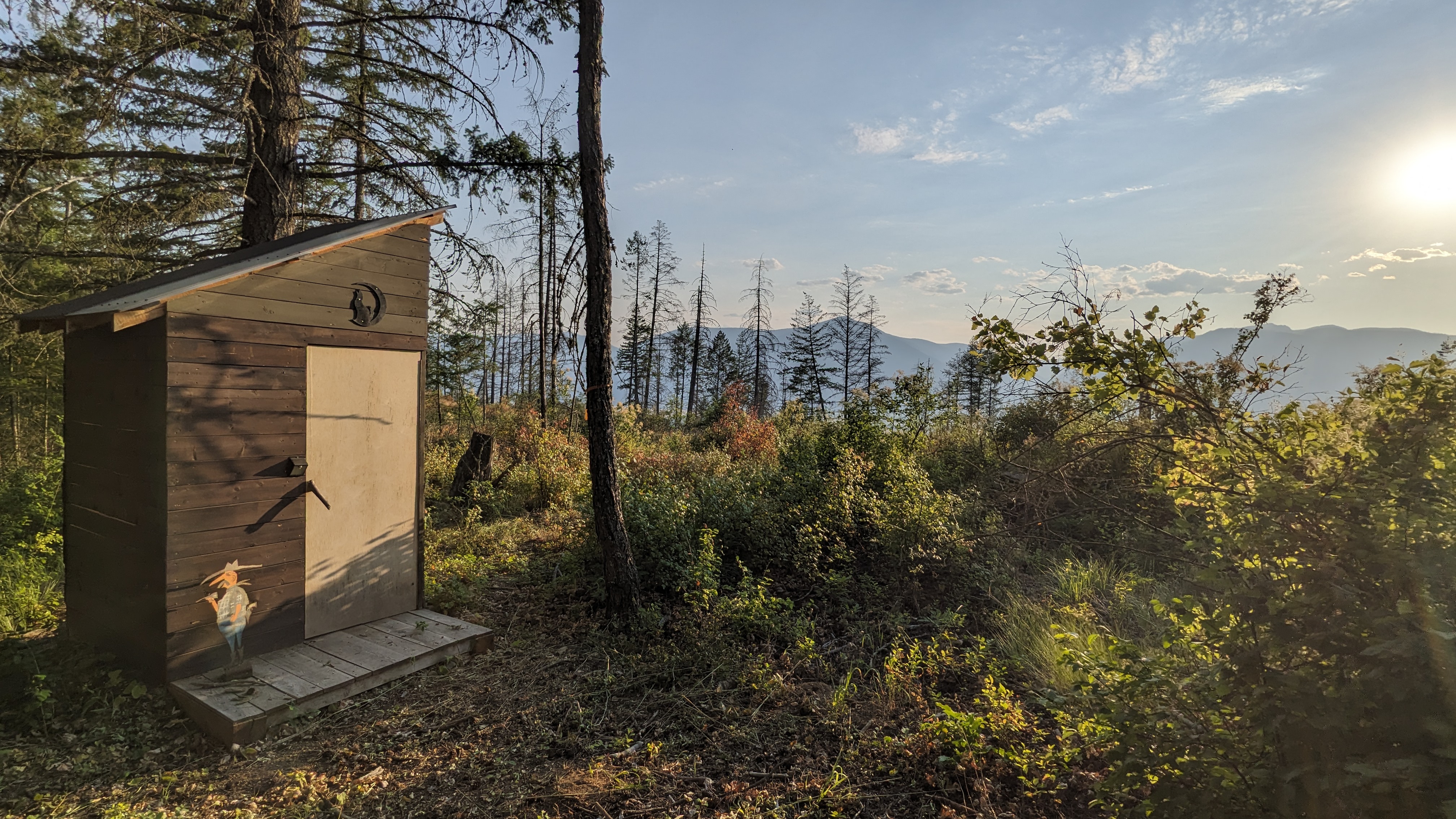 Outhouse with a mountain view